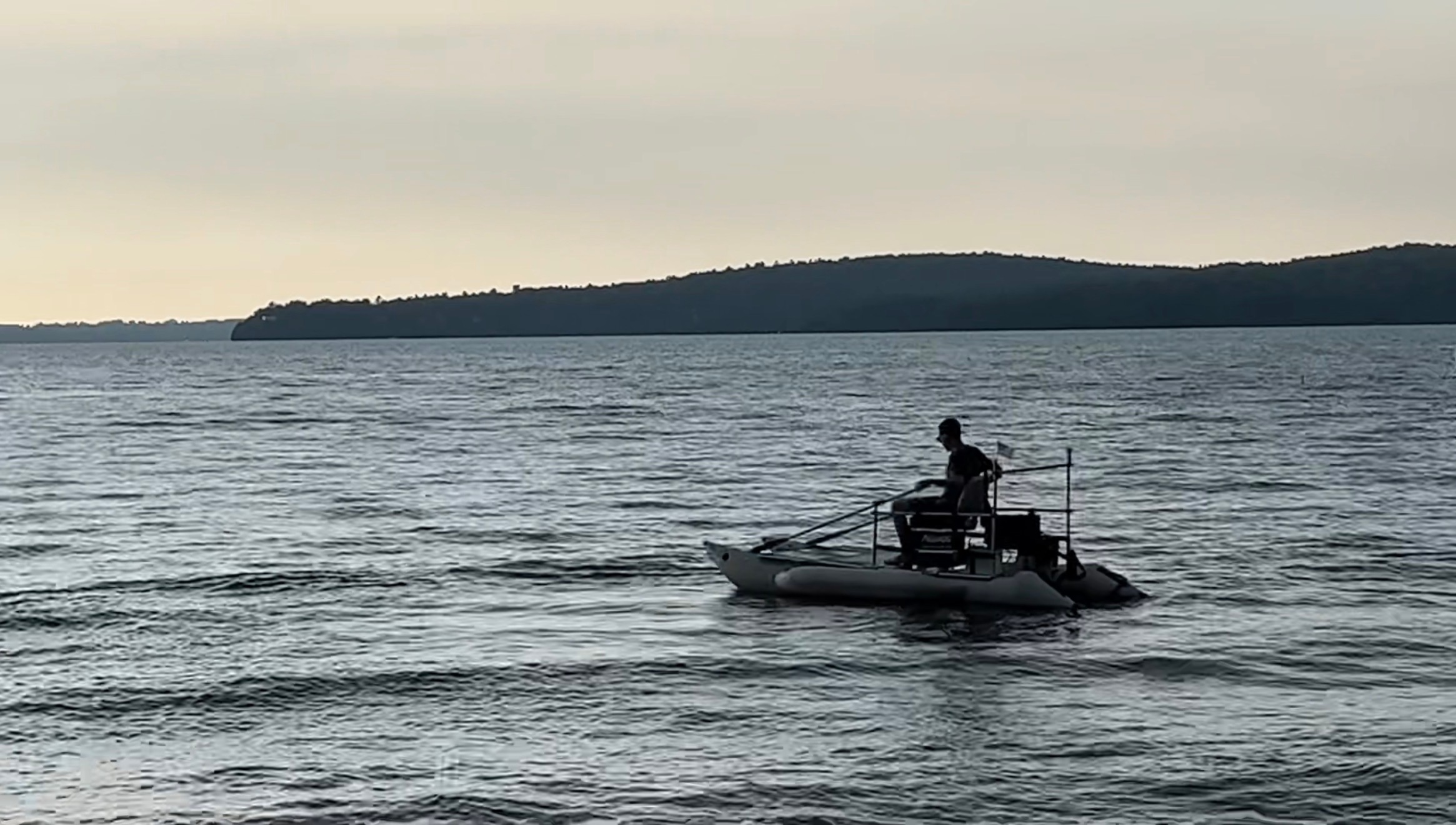 MikeRaft on Malletts Bay with a small American flag